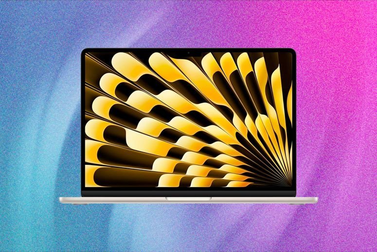 Vista frontal del Apple Macbook Air, un ordenador portátil plateado con un diseño artístico en negro y amarillo en la pantalla.