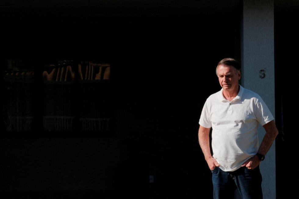 Brazil's former President Jair Bolsonaro looks on from his home in Brasilia, Brazil, on September 29, 2025