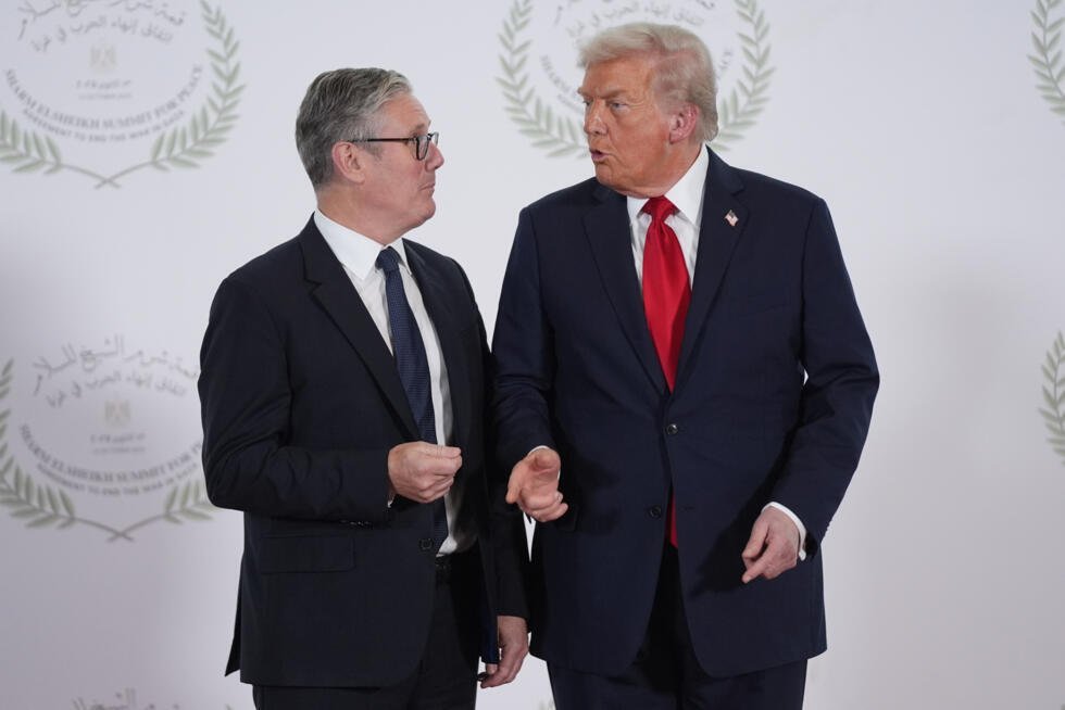 President Donald Trump greets Britain's Prime Minister Keir Starmer during summit to support ending the more than two-year Israel-Hamas war in Gaza.